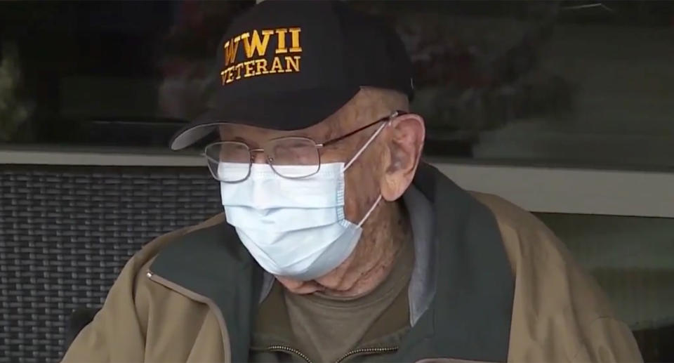 William Lapschies is a 104-year-old who survived coronavirus he is pictured wearing a face mask.