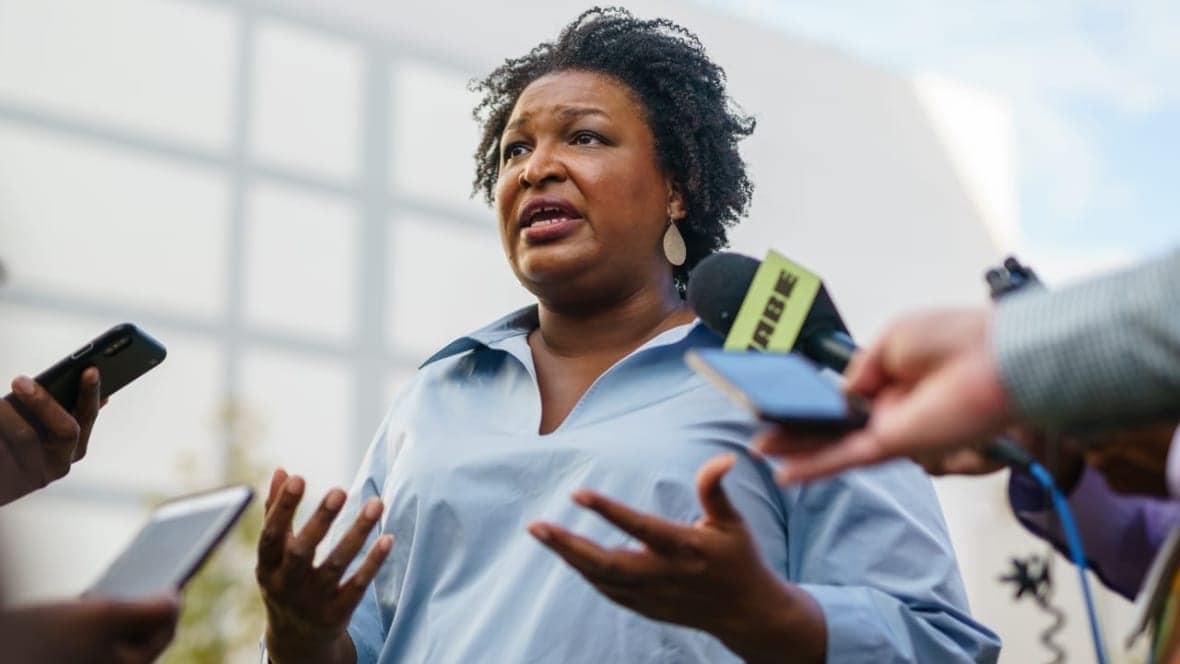 Stacey Abrams, Democratic candidate for Governor of Georgia, speaks to the media after posing for photos with students and encouraging voting at Georgia State University on November 7, 2022 in Atlanta, Georgia. Abrams is in a rematch with Republican Governor Brian Kemp.(Photo by Elijah Nouvelage/Getty Images)