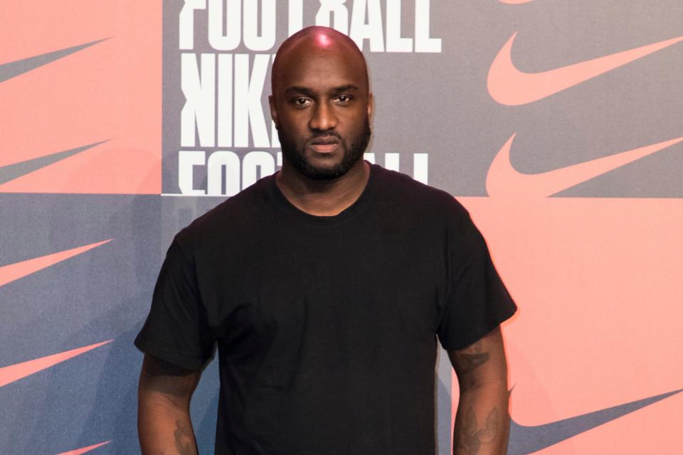 Virgil Abloh poses for photographers upon arrival at the Nike Celebrates The Beautiful Game event, in London on Wednesday, Feb. 7, 2018.  Abloh, a leading fashion executive hailed as the Karl Lagerfeld of his generation, has died after a private battle with cancer. He was 41. Abloh's death was announced Sunday, Nov. 28, 2021 by LVMH Louis Vuitton and the Off White label, the brand he founded.