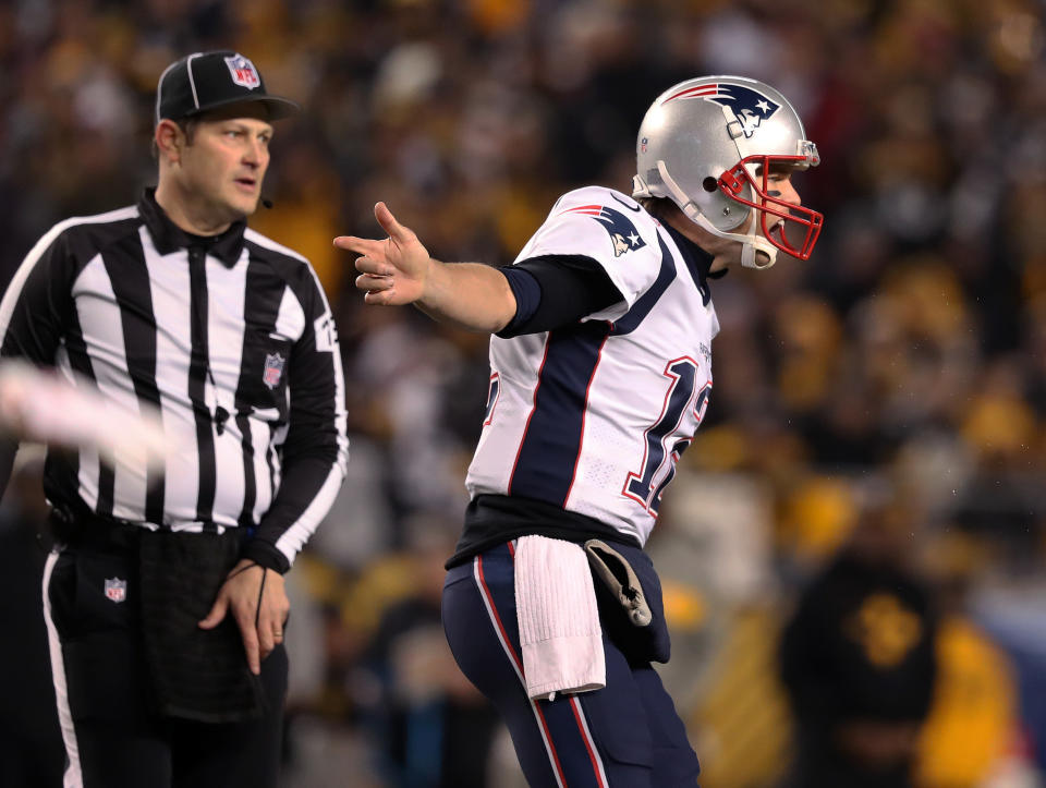 Tom Brady and the Patriots are still in the hunt for a first-round bye in the AFC playoffs. (Getty Images)