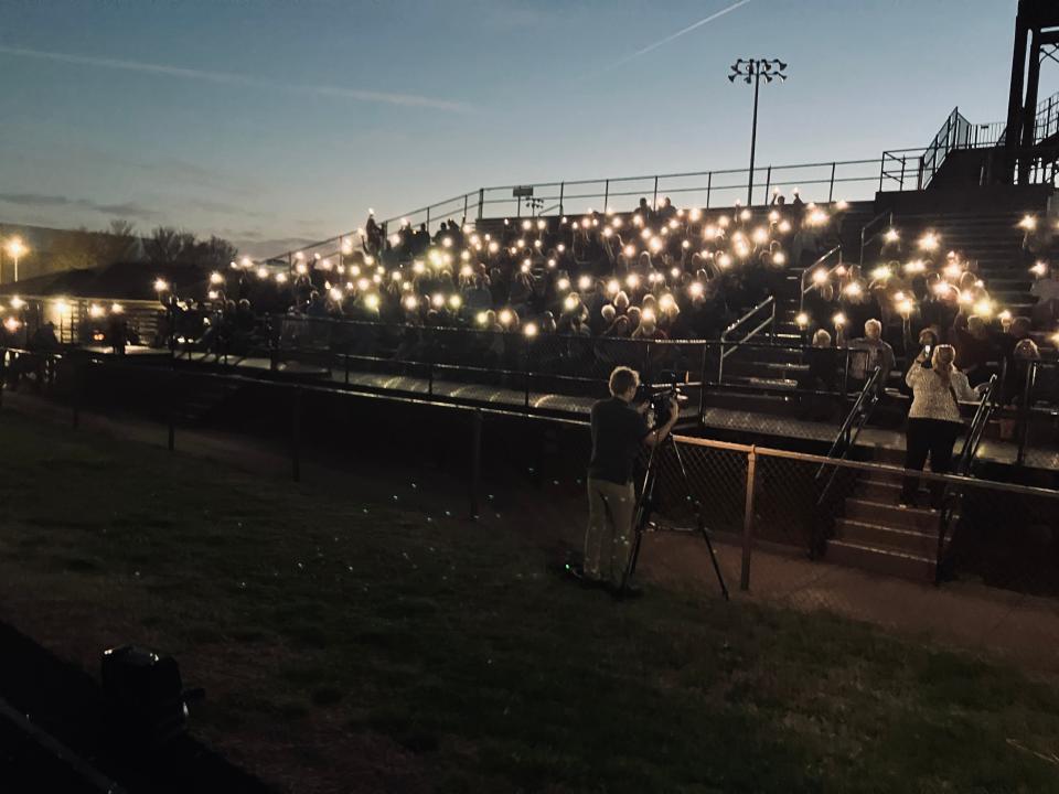 Dozens of people attended a candlelight vigil Wednesday at Kickapoo High School for missing Kickapoo graduate and University of Missouri student Riley Strain.