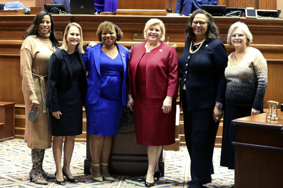 The six women in the South Carolina Senate pose after Sen. Tameika Isaac Devine was sworn in on Tuesday, Jan. 9, 2024. The senators are from left to right: Sen. Mia McLeod, I-Columbia; Sen. Sandy Senn, R-Charleston; Sen. Devine, D-Columbia; Sen. Penry Gustafson, R-Camden; Sen. Margie Bright Matthews, D-Walterboro; and Sen. Katrina Shealy, R-Lexington. (AP Photo/Jeffrey Collins)