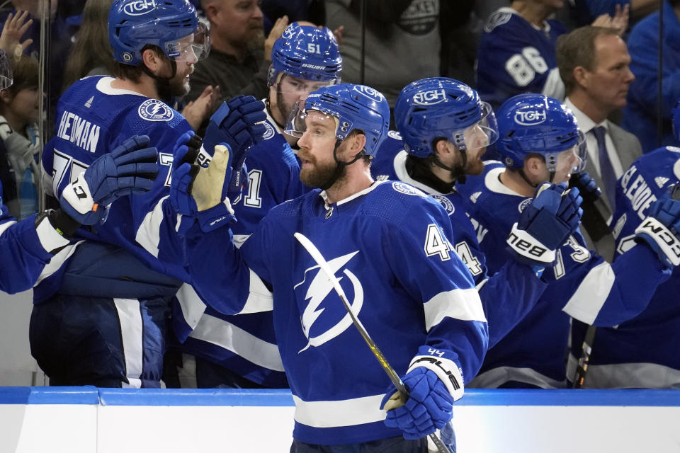 Tampa Bay Lightning defenseman Calvin de Haan (44) celebrates with the bench after scoring against the Anaheim Ducks during the third period of an NHL hockey game Saturday, Jan. 13, 2024, in Tampa, Fla. (AP Photo/Chris O'Meara)