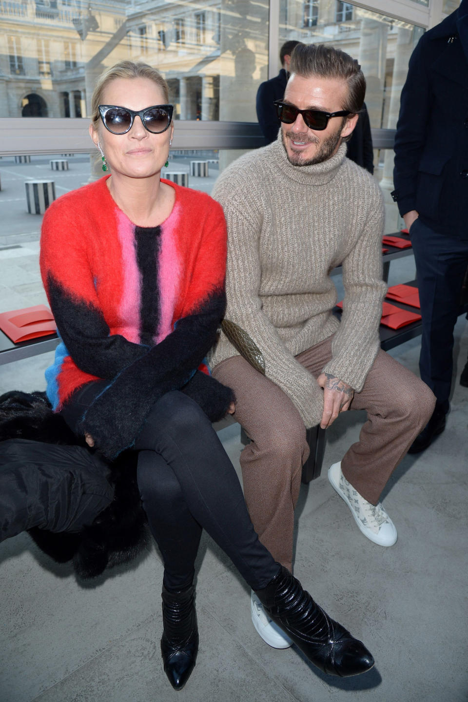 <p><strong>19 February</strong> Kate Moss sat beside David Beckham on the front row of the Louis Vuitton men's show in Paris. Both showed off their finest winter knitwear.</p>