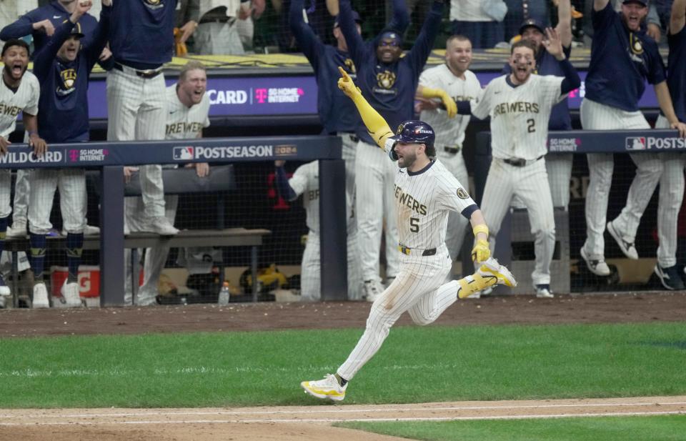 Milwaukee Brewers outfielder Garrett Mitchell (5) hits a two-run home run during the eighth inning of their wild-card playoff game against the New York Mets Wednesday, October 2, 2024 at American Family Field in Milwaukee, Wisconsin.