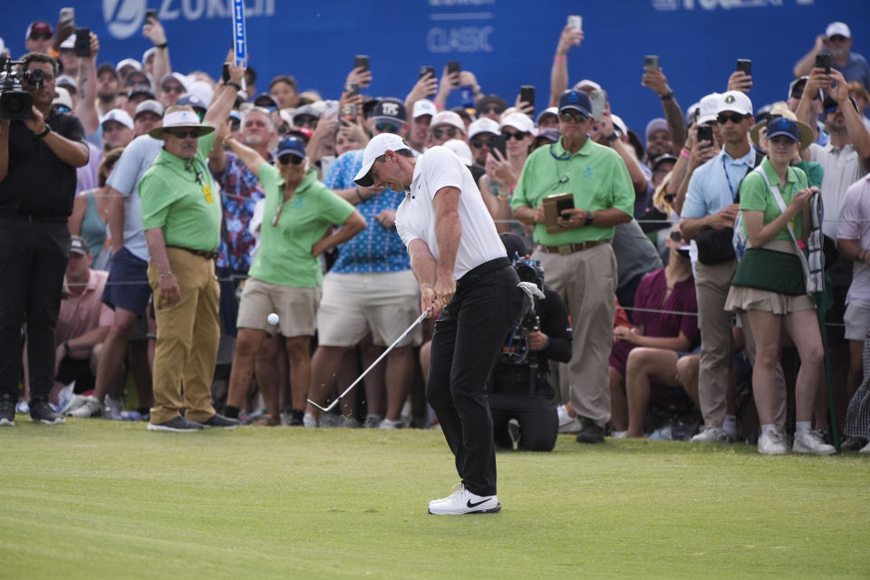 Rory McIlroy, of Northern Ireland, hits onto the 18th green during the final round of the PGA Zurich Classic golf tournament at TPC Louisiana in Avondale, La., Sunday, April 28, 2024. (AP Photo/Gerald Herbert)