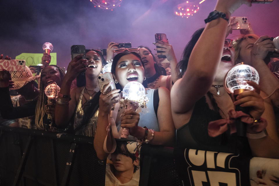 Festivalgoers are seen during the the first weekend of the Coachella Valley Music and Arts Festival at the Empire Polo Club on Friday, April 12, 2024, in Indio, Calif. (Photo by Amy Harris/Invision/AP)