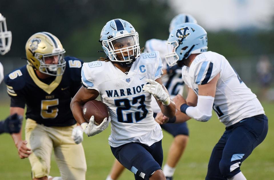 Central Valley's Landon Alexander (23) makes his way to the end zone during the Warriors' Week 0 game at Knoch High School.