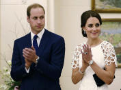 Britain's Prince William, left, and his wife Kate, the Duchess of Cambridge, listen to an address by the Australian Governor General Peter Cosgrove at a reception at Government House in Canberra, Australia Thursday, April 24, 2014. William, Kate, and their son Prince George leave Canberra after Veterans' Day commemorations on Friday, ending a three-week tour of Australia and New Zealand. (AP Photo/Stefan Postles, Pool)