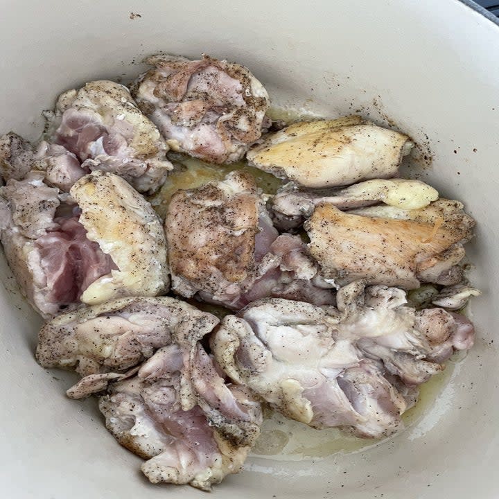 This recipe actually calls for skin-on, bone-in chicken thighs. However, my shopper said that my grocery store was out of stock and replaced them with boneless skinless ones. (Due to this, I actually got BOGO chicken thighs, woo!)I seasoned the chicken thighs with salt and pepper and then gave them a quick brown in my Dutch oven. I also used olive oil instead of butter for no reason other than olive oil is my go-to.