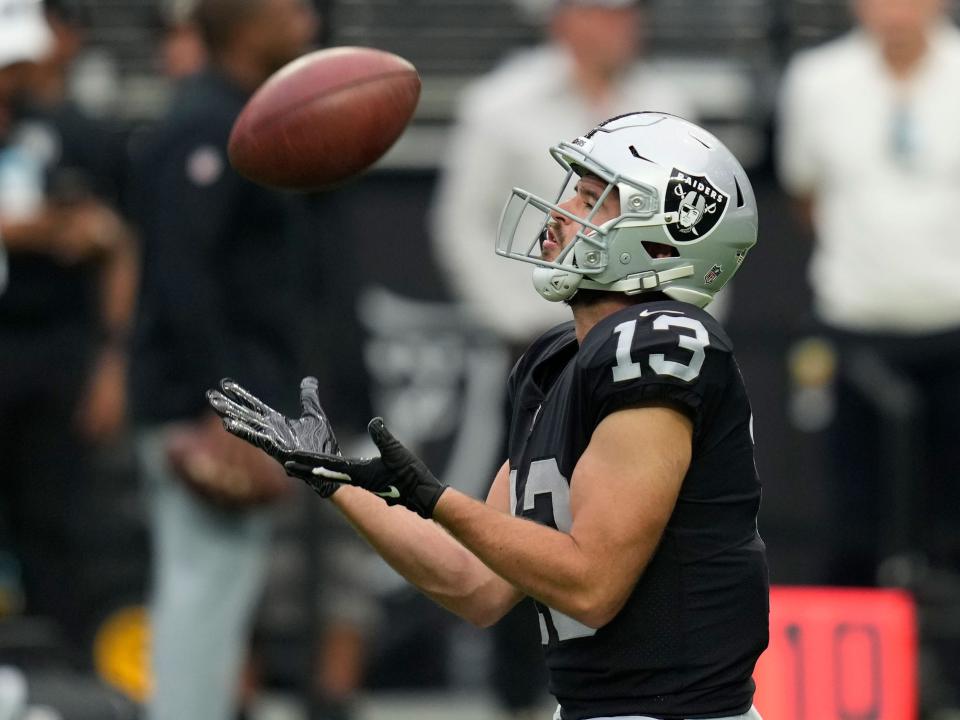 Hunter Renfrow warms up before a game against the Arizona Cardinals.