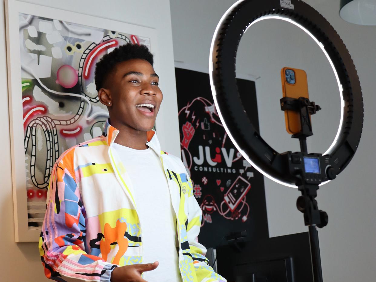 TikTok Gen Z Historian Khalil Greene in front of a ring light.