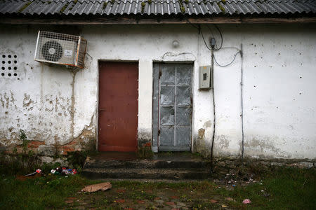 The entrance of a building is seen at the former Trnopolje detention camp near Prijedor, Bosnia and Herzegovina November 13, 2017. Picture taken November 13, 2017. REUTERS/Dado Ruvic