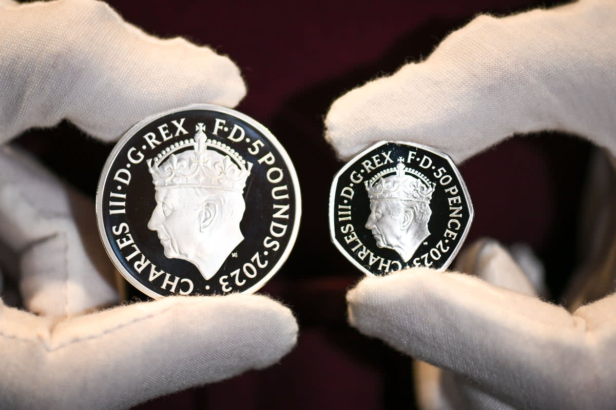 The commemorative Â£5 coin and 50 pence coin is seen at The Royal Mint (Getty Images)