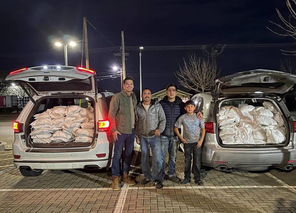 Stanislaus County Supervisor Channce Condit and community volunteers, with about 200 sandbags to distribute to residents in South Modesto, Dec. 29, 2023.