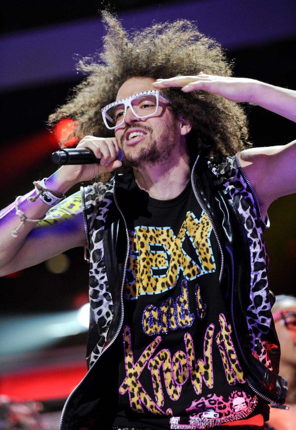 FILE - This Dec. 9, 2011 file photo shows singer RedFoo of LMFAO performing at Z100's Jingle Ball concert at Madison Square Garden in New York. Redfoo is still party rocking, but these days, he's doing it without his partner-in-fun, Sky Blu. Redfoo says he and Sky Blu _ who is also his nephew _ are taking a break as they focus on their own interests, personally and professionally. (AP Photo/Evan Agostini, file)