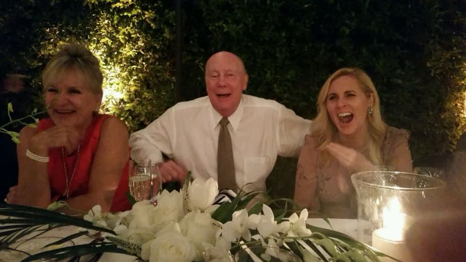 Marianne Garvey and her dad Earl Garvey sit together at a family wedding. - Marianne Garvey/CNN