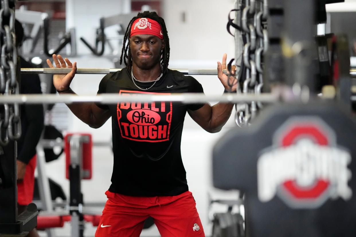 Jul 21, 2023; Columbus, Ohio, USA;  Ohio State Buckeyes wide receiver Marvin Harrison Jr. lifts during a summer workout at the Woody Hayes Athletic Center prior to the start of fall camp. 