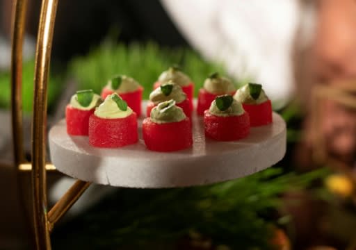 Compressed watermelon hors d'oeuvres are displayed at the Academy Awards Governors Ball press preview in Hollywood, California on January 31