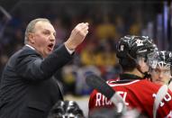 Canada's head coach Brent Sutter dirtects his team against the United States during the second period of their IIHF World Junior Championship ice hockey game in Malmo, Sweden, December 31, 2013. REUTERS/Alexander Demianchuk (SWEDEN - Tags: SPORT ICE HOCKEY)