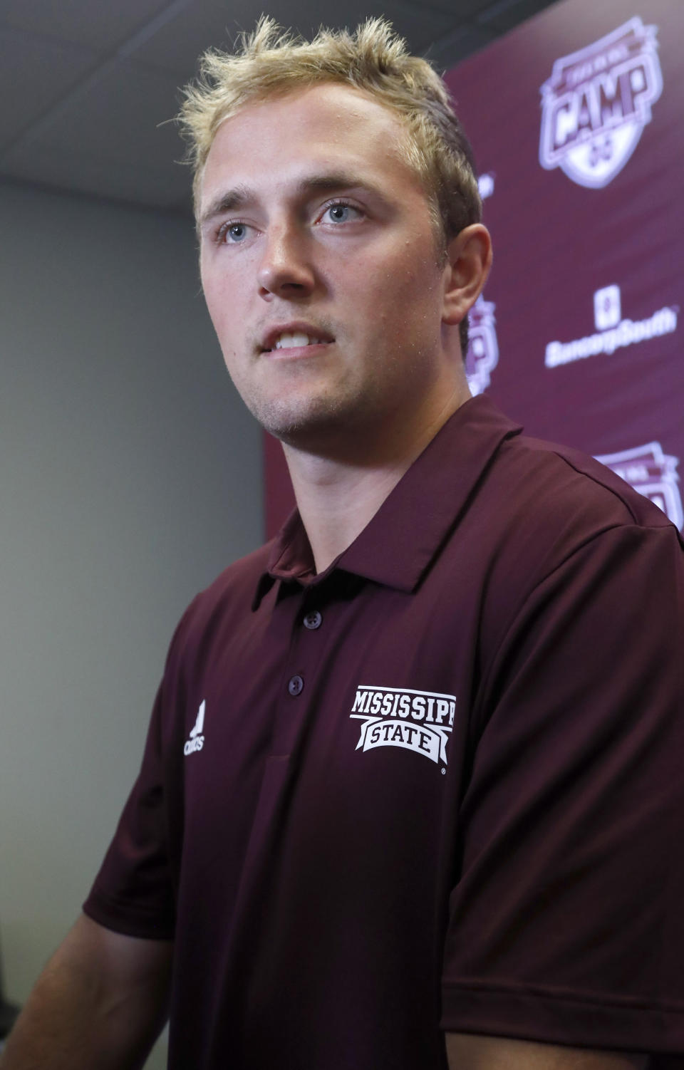 Mississippi State quarterback Tommy Stevens answers a reporter's question about competition among quarterbacks in preseason camp as they prepare for the upcoming NCAA college football season during media day, Saturday, Aug. 10, 2019, in Starkville, Miss. (AP Photo/Rogelio V. Solis)