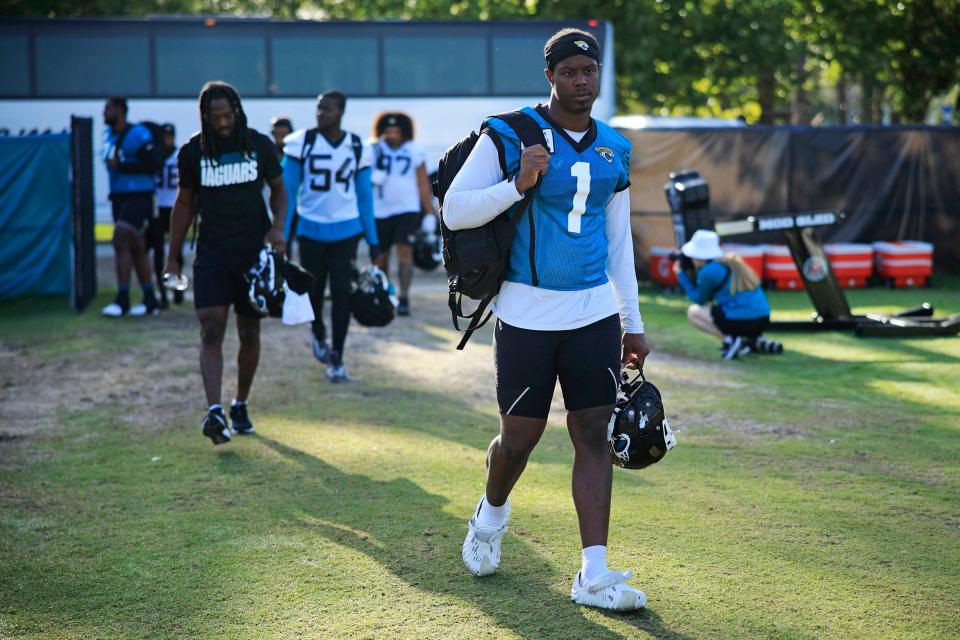 Jacksonville Jaguars running back Travis Etienne Jr. (1) walks off the bus during day 4 of the Jaguars Training Camp Thursday, July 28, 2022 at the Knight Sports Complex at Episcopal School of Jacksonville. 