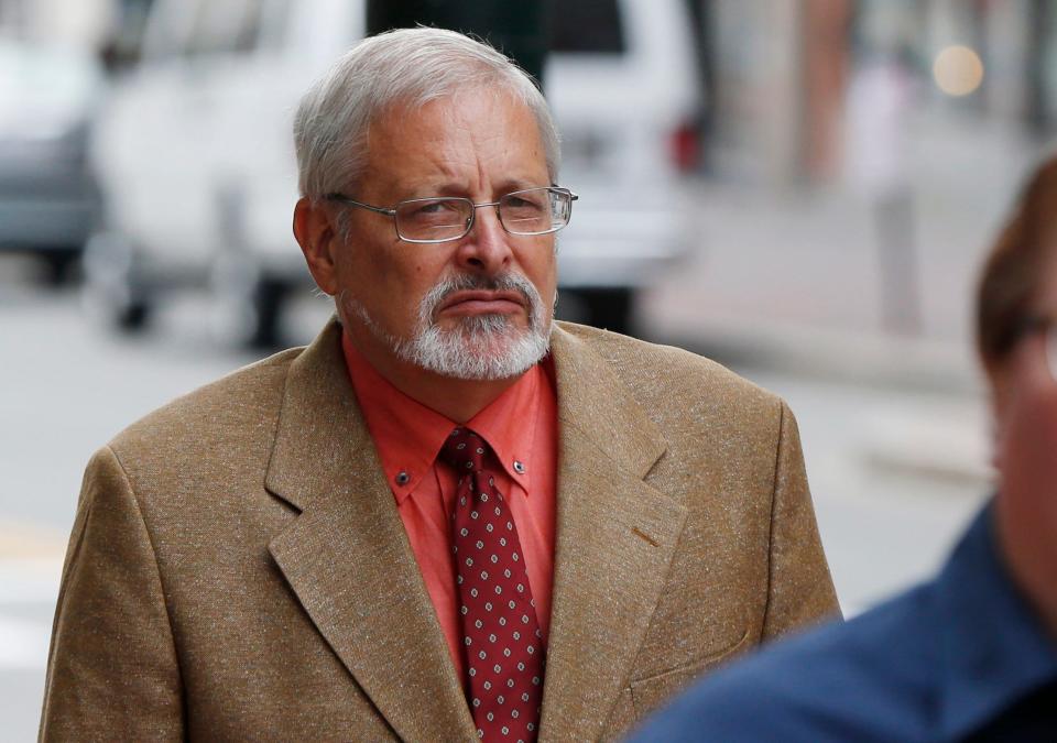 In this July 9, 2015 file photo, Michael Geilenfeld arrives at U.S. Bankruptcy Court, in Portland, Maine. Federal prosecutors say the founder of an orphanage in Haiti is facing criminal charges in the U.S. for allegedly traveling to the Caribbean island nation to engage in sex acts with minors. Geilenfeld previously sued a Maine activist over accusations of abusing boys, calling them “vicious, vile lies,” before the investigation by the Homeland Security Investigations and the FBI led to an indictment in Miami. His attorney had no comment Tuesday, Jan. 23, 2024. The 71-year-old Geilenfeld, who was arrested in Colorado, is expected to have a detention hearing this week in Denver before being flown to Miami.