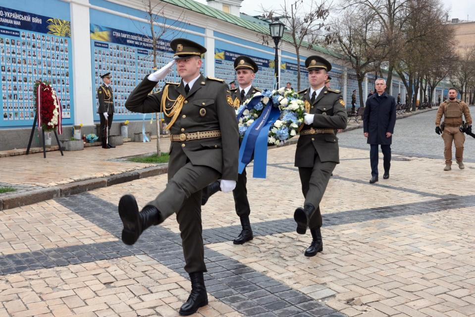 Stoltenberg pays tribute to fallen Ukrainian soldiers on St Michael’s Square in central Kyiv (EPA)