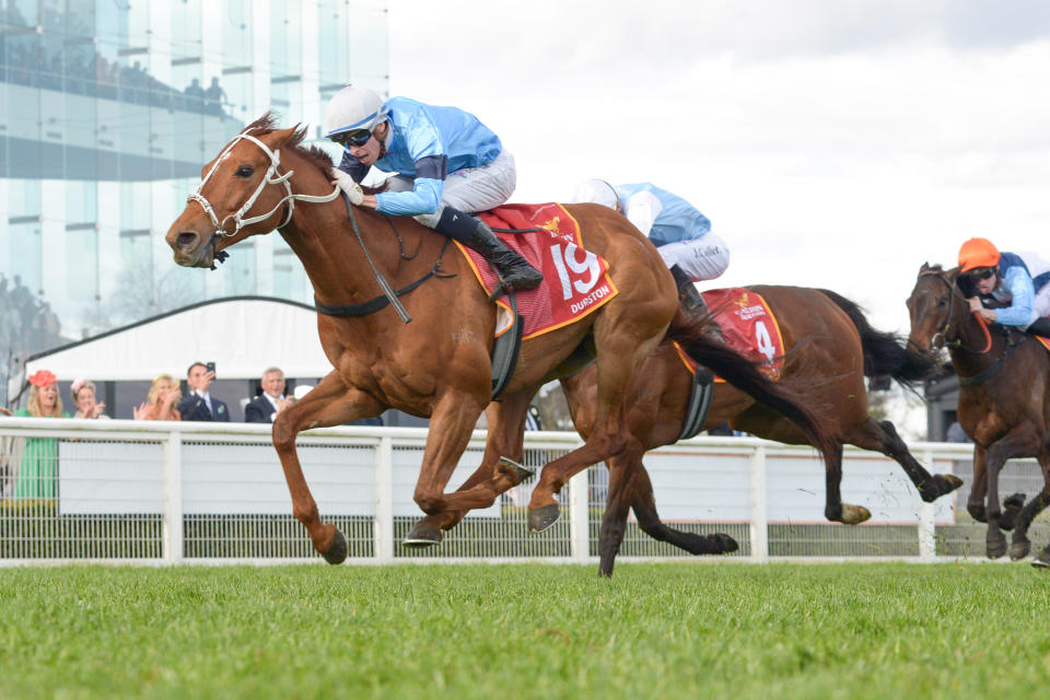 Durston, pictured here winning the Caulfield Cup at Caulfield Racecourse.