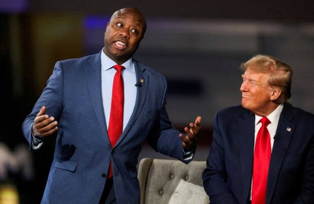 Sen. Tim Scott, seen with former U.S. president and presumptive Republican presidential candidate Donald Trump on Feb. 20 in Greenville, S.C.