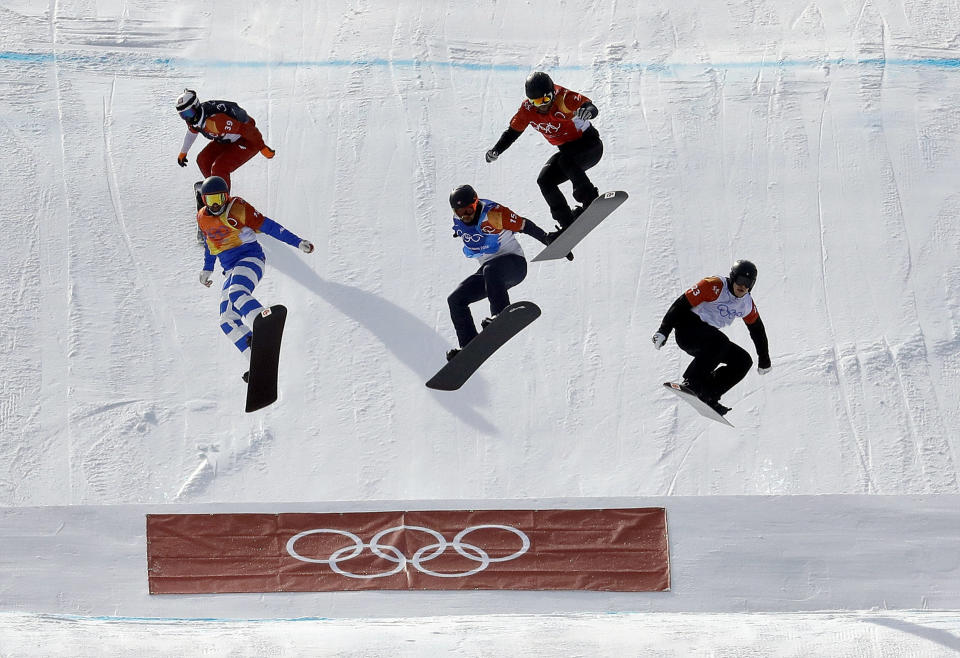 <p>From left; MateuszÂ Ligocki, of Poland, EmanuelÂ Perathoner, of Italy, NickÂ Baumgartner, of the United States,MartinÂ Noerl, of Germany, and AntonÂ Lindfors, of Finland, run the course during the men’s snowboard cross quarterfinal at Phoenix Snow Park at the 2018 Winter Olympics in Pyeongchang, South Korea, Thursday, Feb. 15, 2018. (AP Photo/Lee Jin-man) </p>