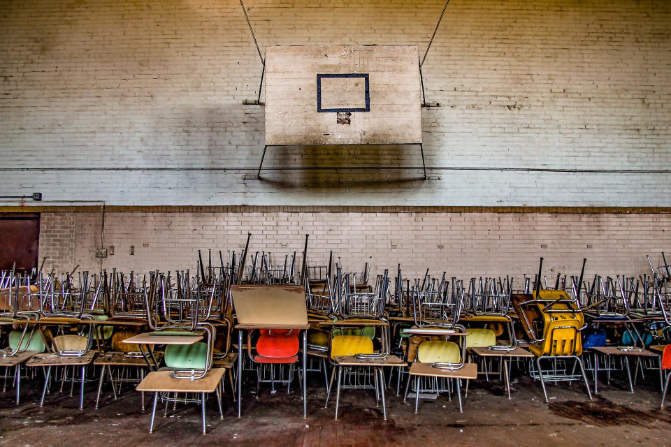 <p>A sports hall with stacked chairs. (Photo: Leland Kent/Caters News) </p>