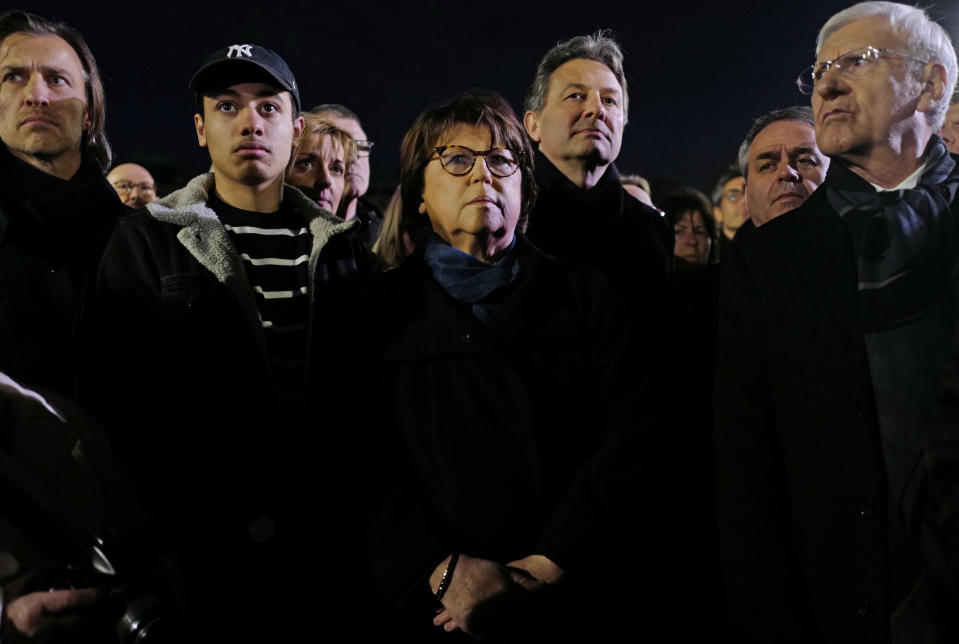 Mayor of Lille, Martine Aubry, centre, joins others during a march, in Lille, northern France, Tuesday, Feb. 19, 2019. French residents and public officials from across the political spectrum geared up Tuesday for nationwide rallies against anti-Semitism following a series of anti-Semitic acts, including the swastikas painted on about 80 gravestones at a Jewish cemetery overnight. (AP Photo/Michel Spingler)