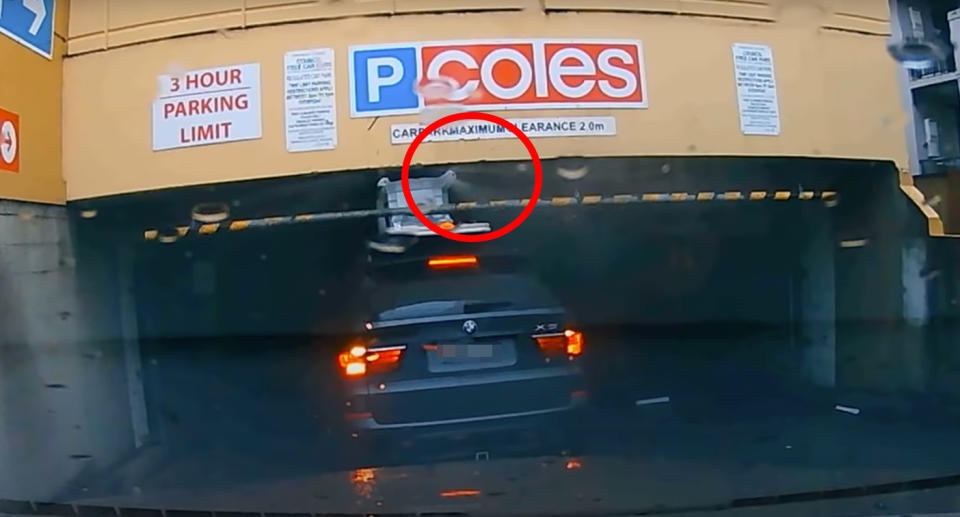 A BMW driver setting off the fire sprinkler with its high load at Coles at Forestville. Source: Dash Cam Owners Australia