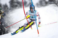 France's Clement Noel speeds down the course during an alpine ski, men's World Cup slalom, in Lenzerheide, Switzerland, Sunday, March 21, 2021. (AP Photo/Gabriele Facciotti)