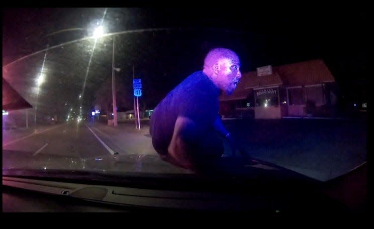 Video from Palmetto Police Department Officer Caleb Cottom's vehicle camera shows Breonte Johnson-Davis on the hood of Cottom's patrol car on Nov. 1, 2023.