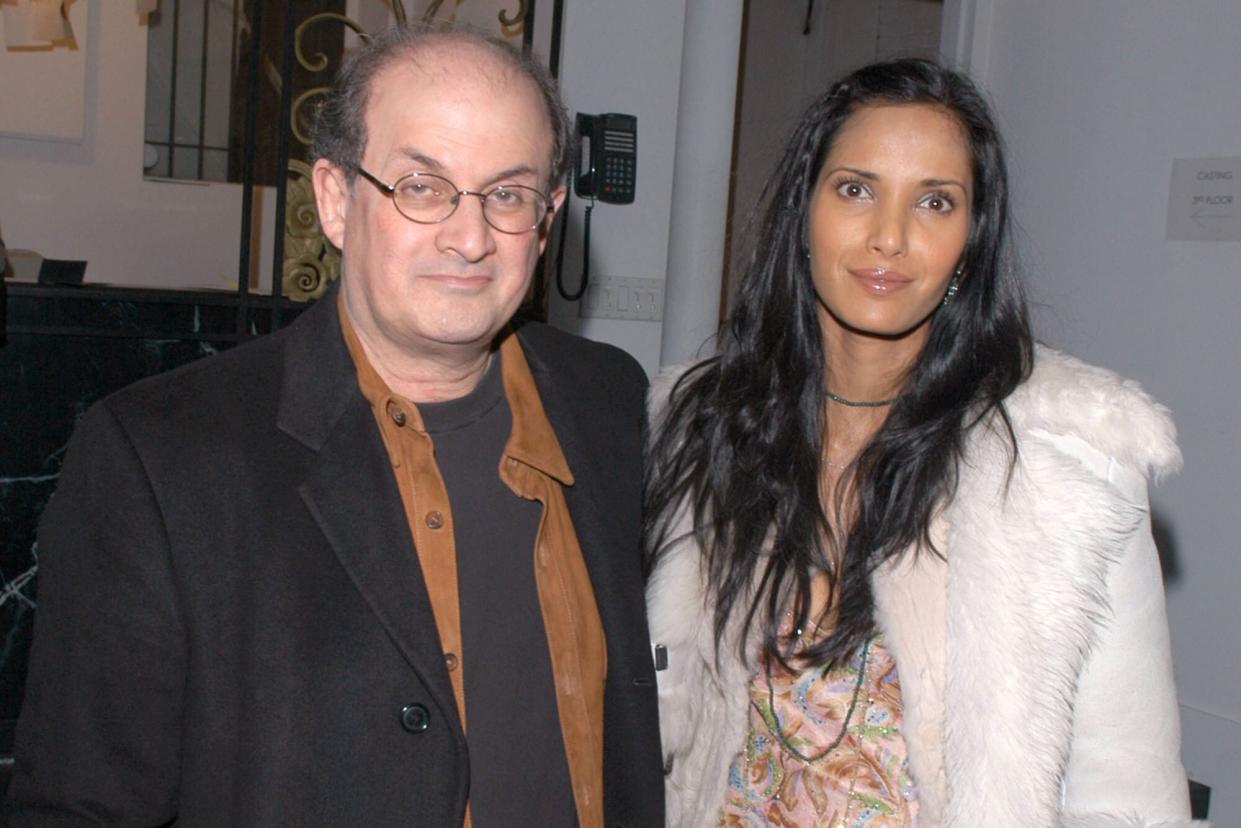 Salman Rushdie and Padma Lakshmi-Rushdie during Olympus Fashion Week Fall 2005 - Diane Von Furstenberg - Backstage and Front Row at 389 West 12th Str in New York City, New York, United States. (Photo by Djamilla Rosa Cochran/WireImage)