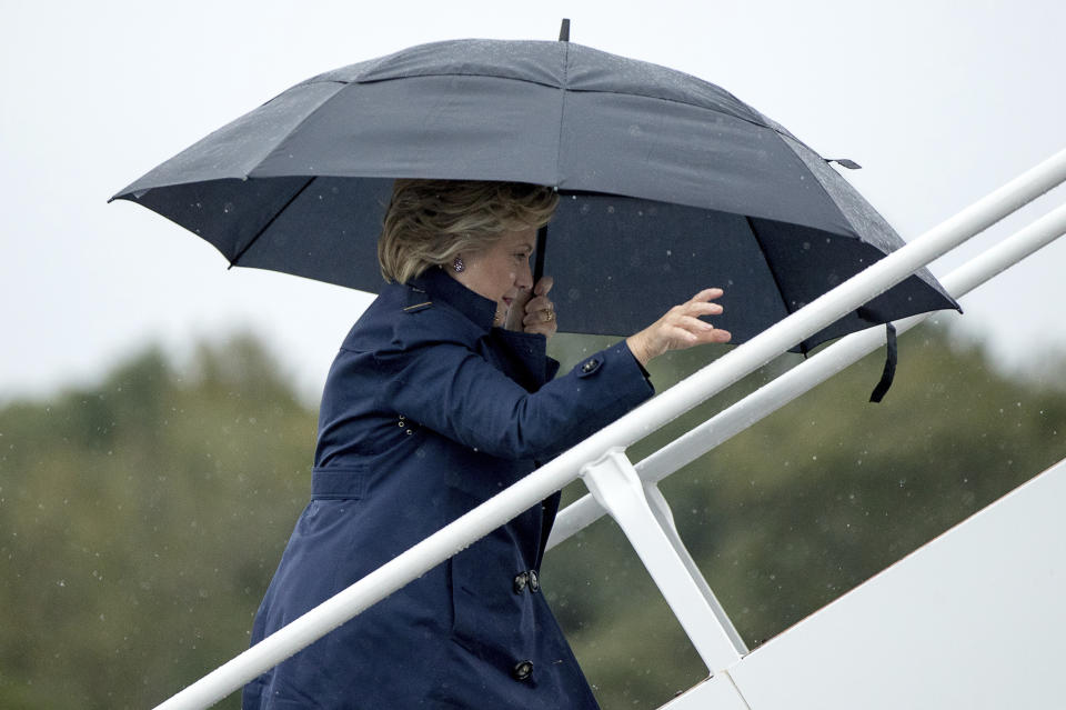 Hillary Clinton boards her campaign plane in White Plains, N.Y., on Oct. 9, 2016, to travel to St. Louis for the second presidential debate. (Photo: Andrew Harnik/AP)