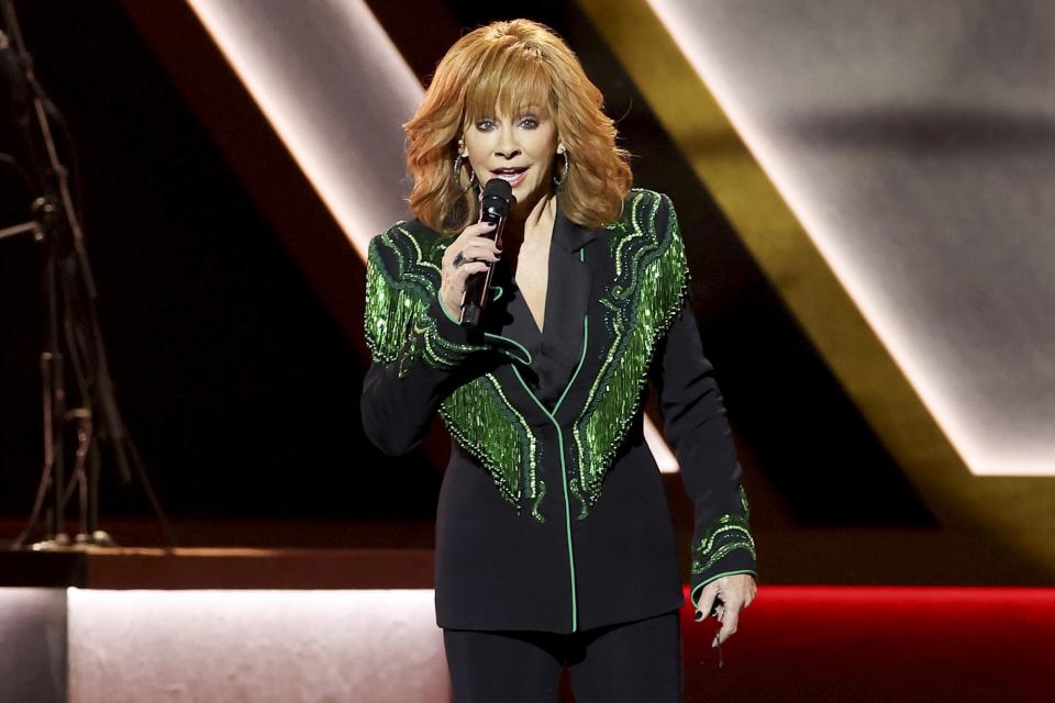 Reba McEntire perform onstage at The 56th Annual CMA Awards at Bridgestone Arena on November 09, 2022 in Nashville, Tennessee