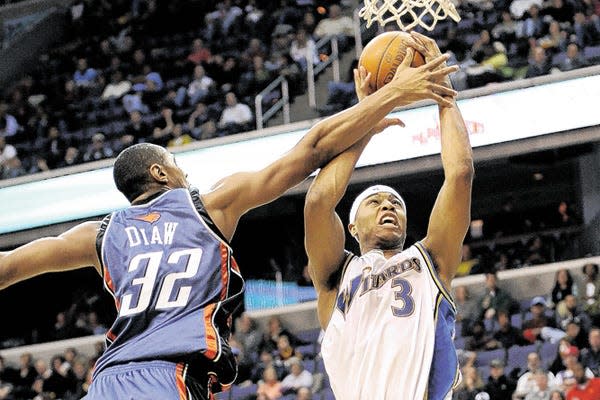 Caron Butler (3) played at Racine Park.