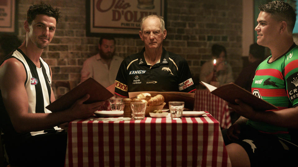 Wayne Bennett sits at the centre of a shot from an upcoming Kayo Sport advertisement, alongside Scott Pendlebury and Latrell Mitchell.