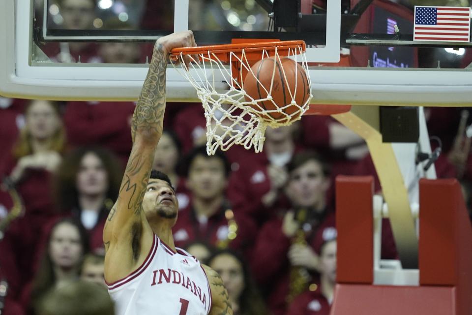 Indiana center Kel'el Ware (1) dunks during the first half of an NCAA college basketball game against Nebraska, Wednesday, Feb. 21, 2024, in Bloomington, Ind. (AP Photo/Darron Cummings)