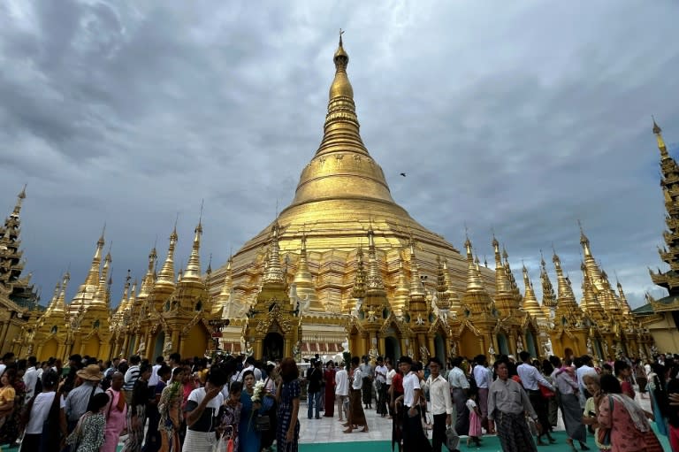 The main, gold-plated spire of the Shwedagon pagoda in Myanmar rises 99 metres (325 feet) into the sky and is believed to house four relics of the Buddha (Sai Aung MAIN)