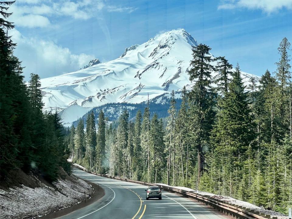 mount hood summit with road and car in foreground