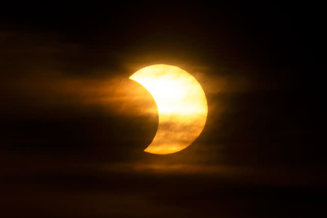 <p>Kena Betancur/AFP/Getty</p> An eclipse in New York City