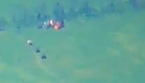 This photo taken from video released by Russian Defense Ministry Press Service on Monday, June 5, 2023, show a Ukrainian military vehicle being hit during a combat in Ukraine. The Russian Defense Ministry said the Russian military fended off an attempt by Ukraine to launch an attack in the southern part of the Donetsk region on Sunday. (Russian Defense Ministry Press Service via AP)