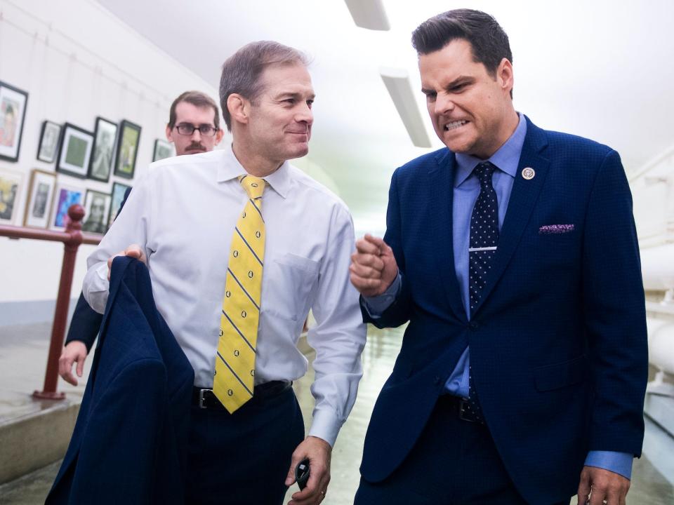 Reps. Jim Jordan, R-Ohio, left, and Matt Gaetz, R-Fla., make their way to a vote in the Capitol on Friday, November 15, 2019.