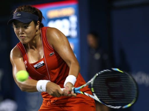 Taiwan's Chan Yung-jan hits a shot to France's Marion Bartoli during their Mercury Insurance Open semi-final match in Carlsbad on July 21. Bartoli struggled mightily in the opening set and Chan profited from the top seed's 20 unforced errors