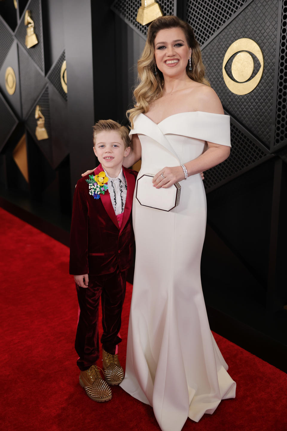LOS ANGELES, CALIFORNIA - FEBRUARY 04: Kelly Clarkson (R) and Remington "Remy" Alexander attend the 66th GRAMMY Awards at Crypto.com Arena on February 04, 2024 in Los Angeles, California. (Photo by Neilson Barnard/Getty Images for The Recording Academy)