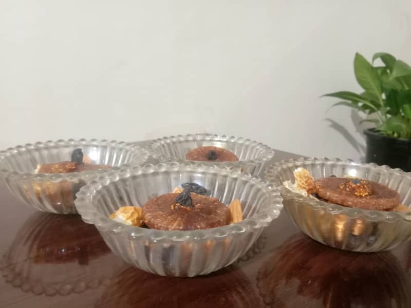 dried fruit in small glass bowls